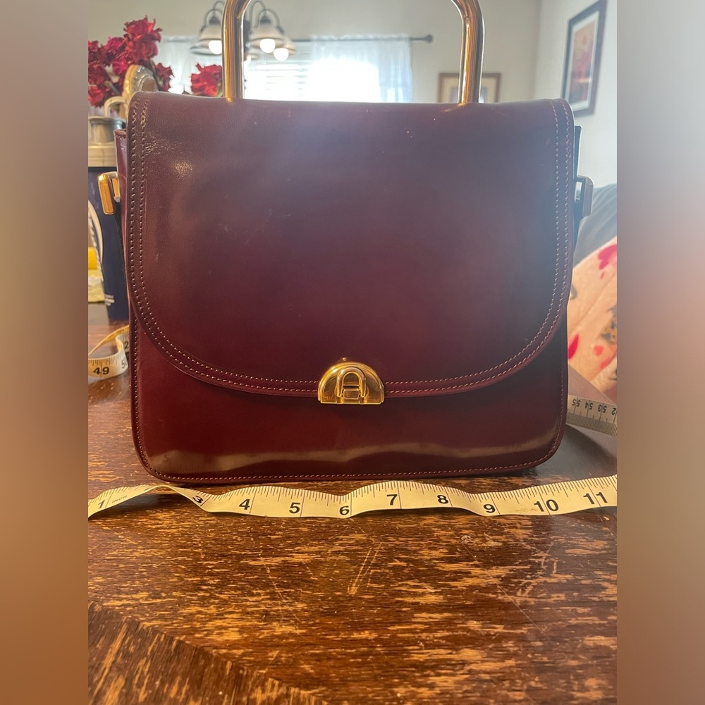 Italian leather clutch, mint condition, no scratches.
